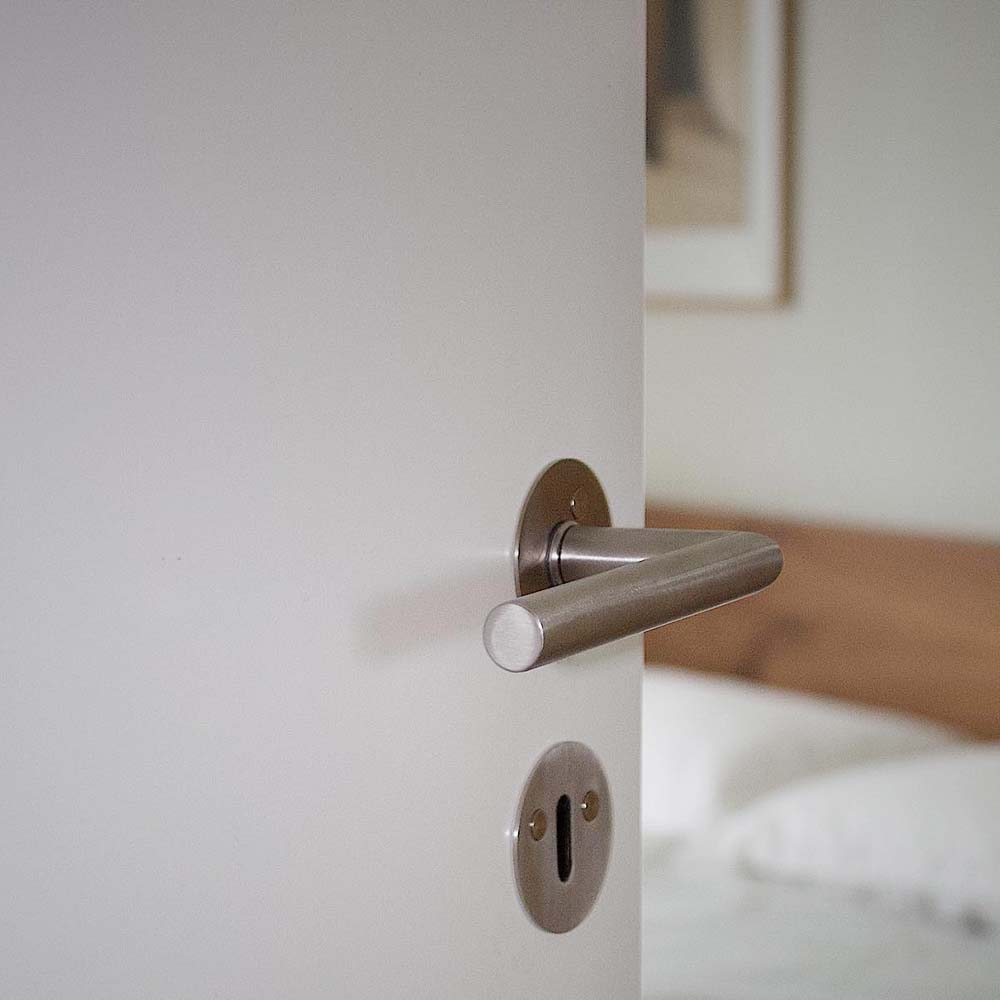 Door handles in stainless steel