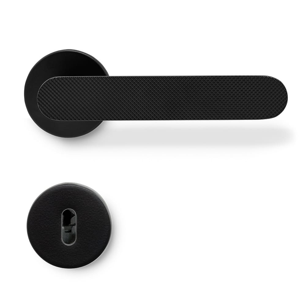 Door handle Vibe Grip with a modern and sleek design in matte black. Vibe Grip is elongated and rounded with a knurled surface.